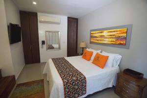 Voodi või voodid majutusasutuse Hotel Ucla Center toas