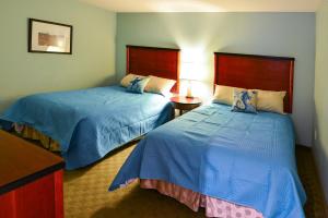 Voodi või voodid majutusasutuse Deluxe Ocean Front Two-Bedroom Condo in Sandy Beach Resort toas +15 fotot