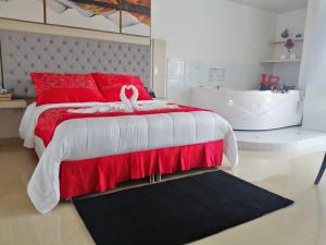 Postel nebo postele na pokoji v ubytování Hotel San Antonio Guarne