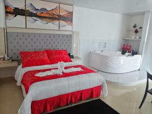Postel nebo postele na pokoji v ubytování Hotel San Antonio Guarne