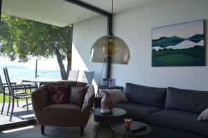 Posezení v ubytování Ferienwohnung Auszeit am Meer - mit Kamin und Sauna