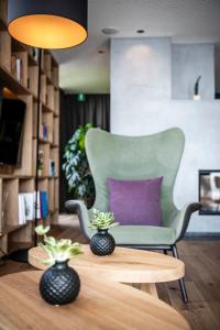 A seating area at Aparthotel Panorama Living Dolomites