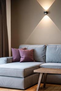A seating area at Aparthotel Panorama Living Dolomites