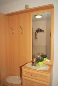 a bathroom with a sink and a mirror at Temelerhof in Gries im Sellrain