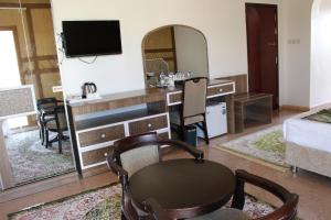 Sjónvarps- og/eða afþreyingartæki á Al Diyar Hotel