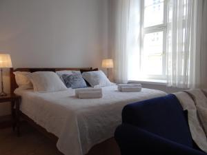 Posteľ alebo postele v izbe v ubytovaní Boutique Aparthotel
