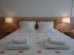 Posteľ alebo postele v izbe v ubytovaní Boutique Aparthotel