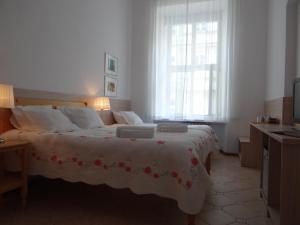 Posteľ alebo postele v izbe v ubytovaní Boutique Aparthotel