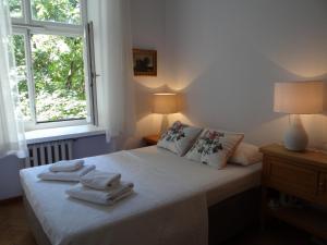 Posteľ alebo postele v izbe v ubytovaní Boutique Aparthotel