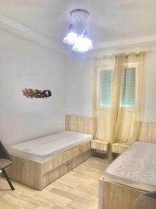 Postel nebo postele na pokoji v ubytování Lux Apartments Krasici