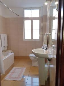 Koupelna v ubytování Residencial Do Vale