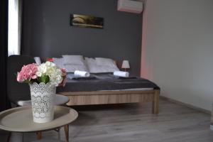 Posteľ alebo postele v izbe v ubytovaní Főnix Design Rooms