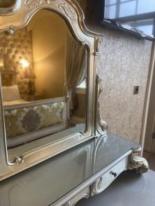 a mirror that is in a room at 30 James Street in Liverpool