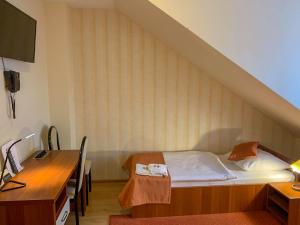Posteľ alebo postele v izbe v ubytovaní Hotel Ostoja