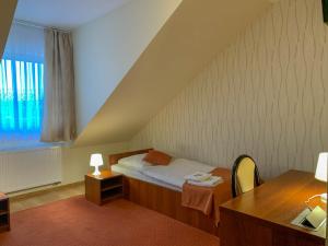 Posteľ alebo postele v izbe v ubytovaní Hotel Ostoja