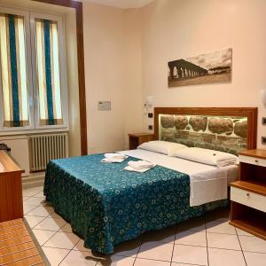 Postel nebo postele na pokoji v ubytování Optimus B&B
