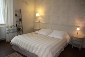 Postel nebo postele na pokoji v ubytování Chambre d'Hôtes de L'Abricotier + 13 fotografií