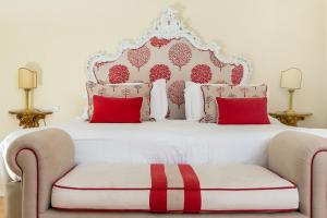 Postel nebo postele na pokoji v ubytování Hotel Punta Regina