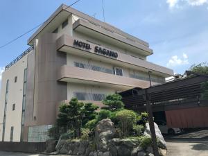 a building with a hotel sacramento sign on it at Hotel Sagano (Adult only) in Kyoto