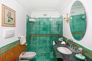 Koupelna v ubytování Hotel Punta Regina