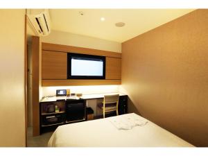 Cama ou camas em um quarto em Henn na Hotel Premier Nara