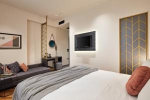 A bed or beds in a room at Λιθεία-Lithia