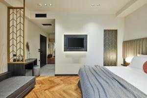 A bed or beds in a room at Λιθεία-Lithia
