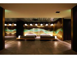 Cama ou camas em um quarto em Henn na Hotel Premier Nara