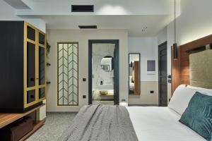 A bed or beds in a room at Λιθεία-Lithia
