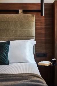 A bed or beds in a room at Λιθεία-Lithia