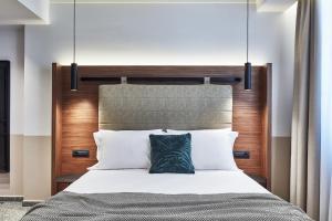 A bed or beds in a room at Λιθεία-Lithia