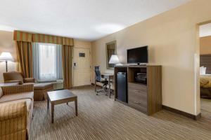 A seating area at Quality Inn & Suites Hanes Mall