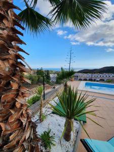 O vedere a piscinei de la sau din apropiere de CASA JAN with pool, mountain and sea views.