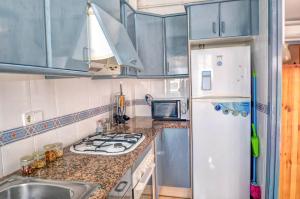 Kuchyň nebo kuchyňský kout v ubytování Parellades Apartment by Hello Homes Sitges