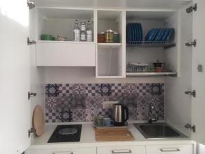 A kitchen or kitchenette at Casa Caterina Deluxe Sorrento Coast