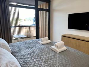 Posteľ alebo postele v izbe v ubytovaní TEE ROOM Čeladná & wellness