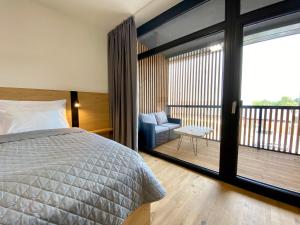 Posteľ alebo postele v izbe v ubytovaní TEE ROOM Čeladná & wellness