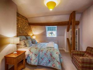 Katil atau katil-katil dalam bilik di Greystones Cottage-Exclusive Welcome Hamper