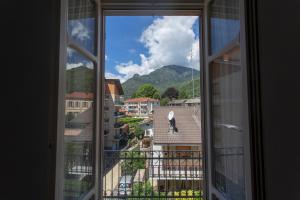 a view from a window of a city at Appartamento con vista a Torre Pellice in Torre Pellice