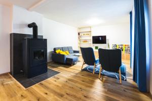 TV a/nebo společenská místnost v ubytování Apartmán LYRA