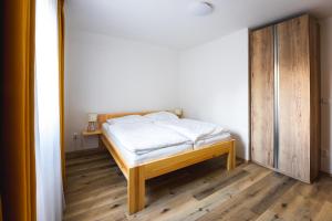 Postel nebo postele na pokoji v ubytování Apartmán LYRA