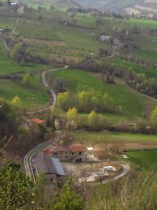 an aerial view of a farm with a train tracks at Il Fienile in Selvapiana