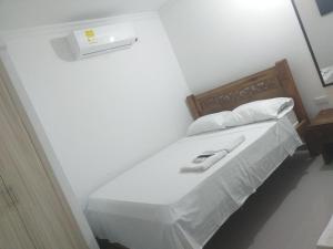 Postelja oz. postelje v sobi nastanitve Altamira Hotel