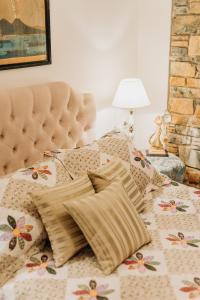 A bed or beds in a room at Elysian Luxury Villa Pelion