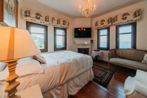 A television and/or entertainment centre at Elysian Luxury Villa Pelion