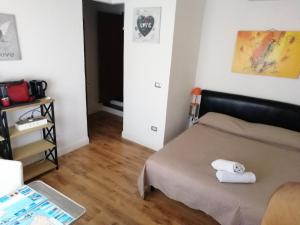 Postel nebo postele na pokoji v ubytování B&B Alghero Republic