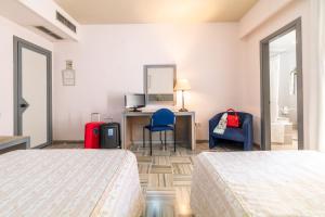 Hotel Abades Manzanil客房内的一张或多张床位
