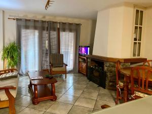 TV a/nebo společenská místnost v ubytování La Fusteria del Casat