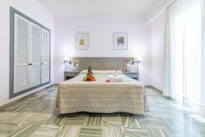 Hotel Abades Manzanil客房内的一张或多张床位