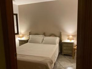 Cama o camas de una habitación en La Fusteria del Casat
